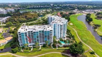 Dazzling golf and sparkling lake views await in this stunning on Boca West Golf and Country Club in Florida - for sale on GolfHomes.com, golf home, golf lot