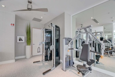 Dazzling golf and sparkling lake views await in this stunning on Boca West Golf and Country Club in Florida - for sale on GolfHomes.com, golf home, golf lot