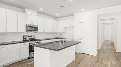 New Construction - Ready Now! Built by Taylor Morrison on Falls Golf Course in Nevada - for sale on GolfHomes.com, golf home, golf lot