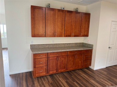 Nestled on a scenic hilltop, this exquisite 2024-built home on Makaha Valley Country Club in Hawaii - for sale on GolfHomes.com, golf home, golf lot