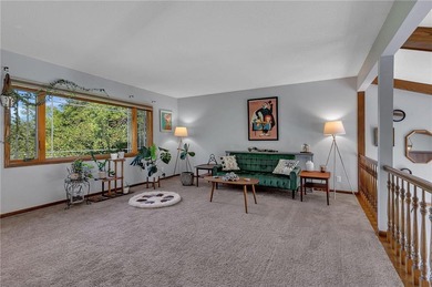 Positioned along the edge of Valley Golf Course, this on Valley Golf Course in Minnesota - for sale on GolfHomes.com, golf home, golf lot