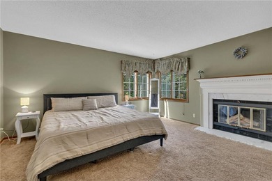 Positioned along the edge of Valley Golf Course, this on Valley Golf Course in Minnesota - for sale on GolfHomes.com, golf home, golf lot