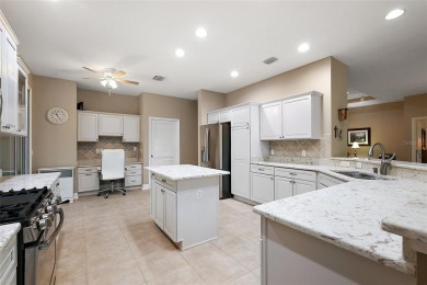 FABULOUS 3/2.5 Bridgeport with HEATED POOL, HOT TUB, and on The Links of Spruce Creek in Florida - for sale on GolfHomes.com, golf home, golf lot