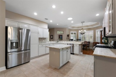 FABULOUS 3/2.5 Bridgeport with HEATED POOL, HOT TUB, and on The Links of Spruce Creek in Florida - for sale on GolfHomes.com, golf home, golf lot