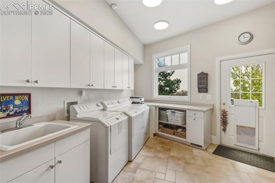 A golfers dream, this extraordinary custom residence backs to on Broadmoor Golf Club in Colorado - for sale on GolfHomes.com, golf home, golf lot