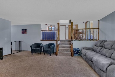 Positioned along the edge of Valley Golf Course, this on Valley Golf Course in Minnesota - for sale on GolfHomes.com, golf home, golf lot