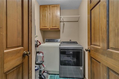 Positioned along the edge of Valley Golf Course, this on Valley Golf Course in Minnesota - for sale on GolfHomes.com, golf home, golf lot