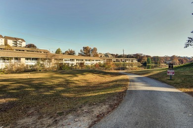 Clean and cute vacation condo located in the gated community of on Pointe Royale Village Country Club in Missouri - for sale on GolfHomes.com, golf home, golf lot