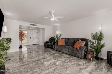 This beautifully updated Sun City home is perfectly situated on on Quail Run Golf Course in Arizona - for sale on GolfHomes.com, golf home, golf lot