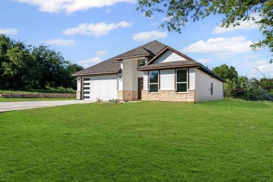 A MUST SEE... PRICED TO SELL!! Beautiful new construction with 3 on The Club At Runaway Bay in Texas - for sale on GolfHomes.com, golf home, golf lot