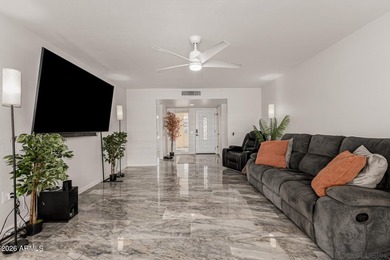 This beautifully updated Sun City home is perfectly situated on on Quail Run Golf Course in Arizona - for sale on GolfHomes.com, golf home, golf lot