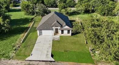 A MUST SEE... PRICED TO SELL!! Beautiful new construction with 3 on The Club At Runaway Bay in Texas - for sale on GolfHomes.com, golf home, golf lot