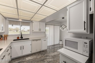 This beautifully updated Sun City home is perfectly situated on on Quail Run Golf Course in Arizona - for sale on GolfHomes.com, golf home, golf lot