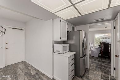 This beautifully updated Sun City home is perfectly situated on on Quail Run Golf Course in Arizona - for sale on GolfHomes.com, golf home, golf lot