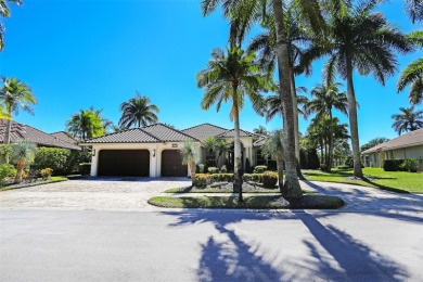 Experience the epitome of luxury in the esteemed Weston Hills on Weston Hills Country Club in Florida - for sale on GolfHomes.com, golf home, golf lot