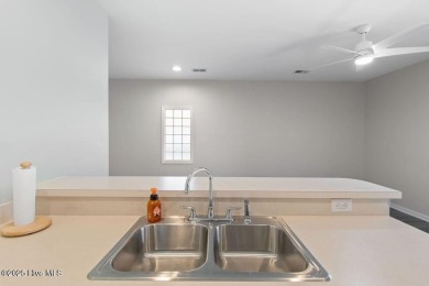 This third floor Royal Poste golf front condo in the vibrant on Sea Trail Golf Resort in North Carolina - for sale on GolfHomes.com, golf home, golf lot