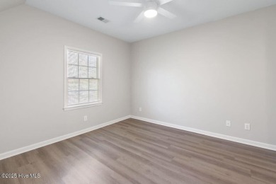 This third floor Royal Poste golf front condo in the vibrant on Sea Trail Golf Resort in North Carolina - for sale on GolfHomes.com, golf home, golf lot