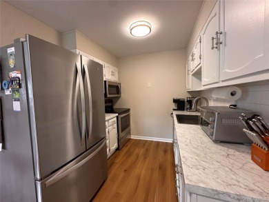 Welcome to this beautifully updated Greenbriar model. This on Leisure Village Golf Course in New York - for sale on GolfHomes.com, golf home, golf lot