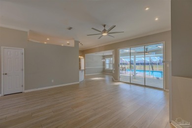 Situated on Hole 16 of Tiger Point Golf Course, this 4 bedroom on Tiger Point Golf and Country Club in Florida - for sale on GolfHomes.com, golf home, golf lot