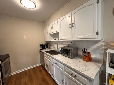 Welcome to this beautifully updated Greenbriar model. This on Leisure Village Golf Course in New York - for sale on GolfHomes.com, golf home, golf lot