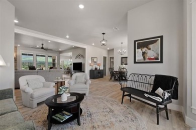 This stunning 4-bedroom, 2.5 bath home is perfectly situated on on Wolf Ridge Golf Course in Oklahoma - for sale on GolfHomes.com, golf home, golf lot