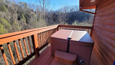 Charming Mountain Cabin with Views, Hot Tub & STR Income on Bent Creek Golf Course in Tennessee - for sale on GolfHomes.com, golf home, golf lot