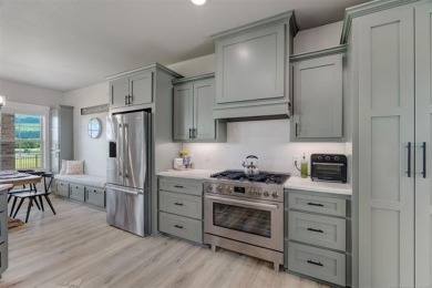 This stunning 4-bedroom, 2.5 bath home is perfectly situated on on Wolf Ridge Golf Course in Oklahoma - for sale on GolfHomes.com, golf home, golf lot