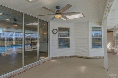 Situated on Hole 16 of Tiger Point Golf Course, this 4 bedroom on Tiger Point Golf and Country Club in Florida - for sale on GolfHomes.com, golf home, golf lot