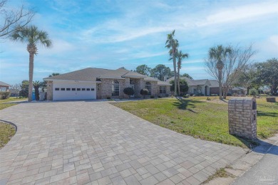 Situated on Hole 16 of Tiger Point Golf Course, this 4 bedroom on Tiger Point Golf and Country Club in Florida - for sale on GolfHomes.com, golf home, golf lot