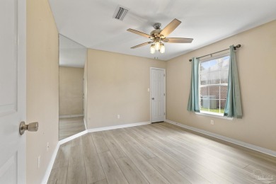 Situated on Hole 16 of Tiger Point Golf Course, this 4 bedroom on Tiger Point Golf and Country Club in Florida - for sale on GolfHomes.com, golf home, golf lot