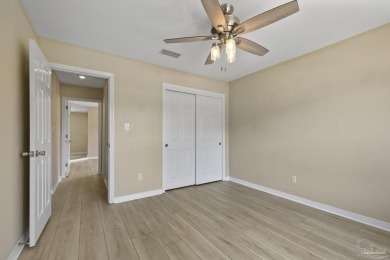 Situated on Hole 16 of Tiger Point Golf Course, this 4 bedroom on Tiger Point Golf and Country Club in Florida - for sale on GolfHomes.com, golf home, golf lot
