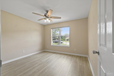 Situated on Hole 16 of Tiger Point Golf Course, this 4 bedroom on Tiger Point Golf and Country Club in Florida - for sale on GolfHomes.com, golf home, golf lot