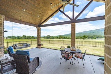This stunning 4-bedroom, 2.5 bath home is perfectly situated on on Wolf Ridge Golf Course in Oklahoma - for sale on GolfHomes.com, golf home, golf lot
