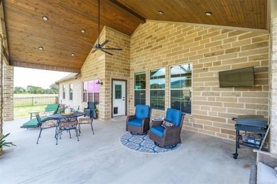 This stunning 4-bedroom, 2.5 bath home is perfectly situated on on Wolf Ridge Golf Course in Oklahoma - for sale on GolfHomes.com, golf home, golf lot