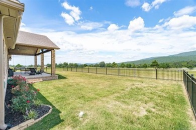 This stunning 4-bedroom, 2.5 bath home is perfectly situated on on Wolf Ridge Golf Course in Oklahoma - for sale on GolfHomes.com, golf home, golf lot