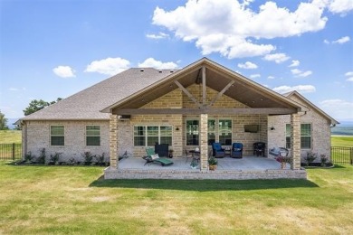 This stunning 4-bedroom, 2.5 bath home is perfectly situated on on Wolf Ridge Golf Course in Oklahoma - for sale on GolfHomes.com, golf home, golf lot
