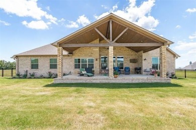 This stunning 4-bedroom, 2.5 bath home is perfectly situated on on Wolf Ridge Golf Course in Oklahoma - for sale on GolfHomes.com, golf home, golf lot