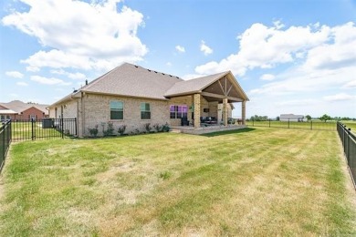 This stunning 4-bedroom, 2.5 bath home is perfectly situated on on Wolf Ridge Golf Course in Oklahoma - for sale on GolfHomes.com, golf home, golf lot