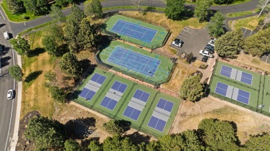 Nestled on the 1st hole with serene views of perfectly manicured on Broken Top Club in Oregon - for sale on GolfHomes.com, golf home, golf lot