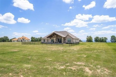 This stunning 4-bedroom, 2.5 bath home is perfectly situated on on Wolf Ridge Golf Course in Oklahoma - for sale on GolfHomes.com, golf home, golf lot