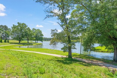 FRONT ROW SEATS TO A LAKE VIEW! Looking for one-level living on Lakeshore Golf Course in North Carolina - for sale on GolfHomes.com, golf home, golf lot