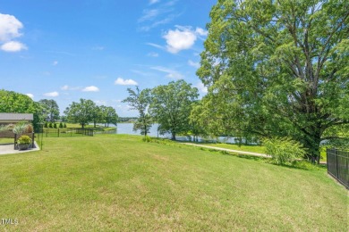 FRONT ROW SEATS TO A LAKE VIEW! Looking for one-level living on Lakeshore Golf Course in North Carolina - for sale on GolfHomes.com, golf home, golf lot