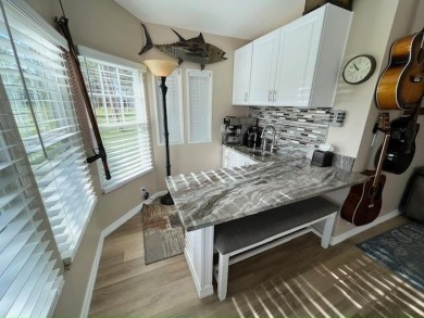 A SHOW STOPPER! Renovated 2bd/2ba home on Lake/Golf course. 1736 on Del Tura Golf and Country Club in Florida - for sale on GolfHomes.com, golf home, golf lot