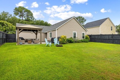 This beautifully maintained one-story home in the highly on Golf Club At Wescott Plantation in South Carolina - for sale on GolfHomes.com, golf home, golf lot