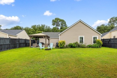 This beautifully maintained one-story home in the highly on Golf Club At Wescott Plantation in South Carolina - for sale on GolfHomes.com, golf home, golf lot