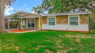 Discover this beautifully renovated 4-bedroom, 2-bathroom home on Temple Terrace Golf and Country Club in Florida - for sale on GolfHomes.com, golf home, golf lot