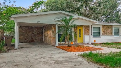 Discover this beautifully renovated 4-bedroom, 2-bathroom home on Temple Terrace Golf and Country Club in Florida - for sale on GolfHomes.com, golf home, golf lot
