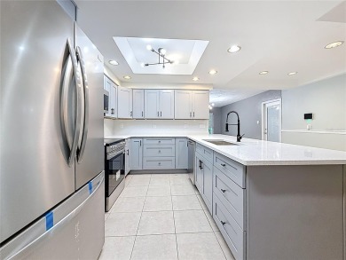Discover this beautifully renovated 4-bedroom, 2-bathroom home on Temple Terrace Golf and Country Club in Florida - for sale on GolfHomes.com, golf home, golf lot