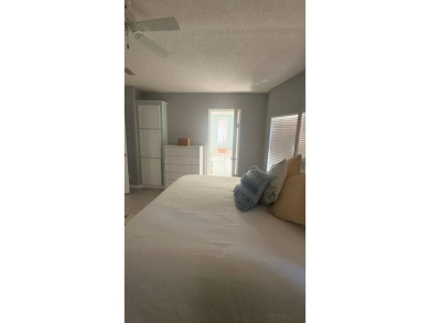 2 Bed | 2 Bath | Golf & Water Views | Gated 55+ Community - The on Sabal Springs Golf and Racquet Club in Florida - for sale on GolfHomes.com, golf home, golf lot