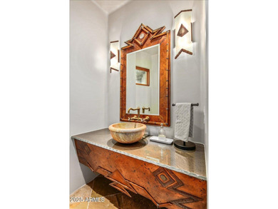 Nestled in a prestigious gated community, this meticulously on Troon North Golf Club  in Arizona - for sale on GolfHomes.com, golf home, golf lot